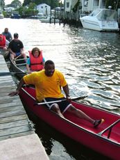 Several canoes maneuvering